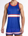 BANG Miami Shane Gym Tank Top from the Heated Rivalry series featuring a royal blue colorway, hockey-inspired stripe detailing, and athletic performance styling.