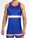 BANG Miami Shane Gym Tank Top from the Heated Rivalry series featuring a royal blue colorway, hockey-inspired stripe detailing, and athletic performance styling.