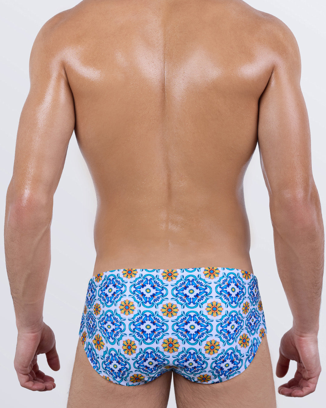 Back of THE TILE IS HIGH men's swim sunga by DC2 Miami – bold luxury swimwear with Mediterranean mosaic pattern, snug athletic fit, and sculpted silhouette.