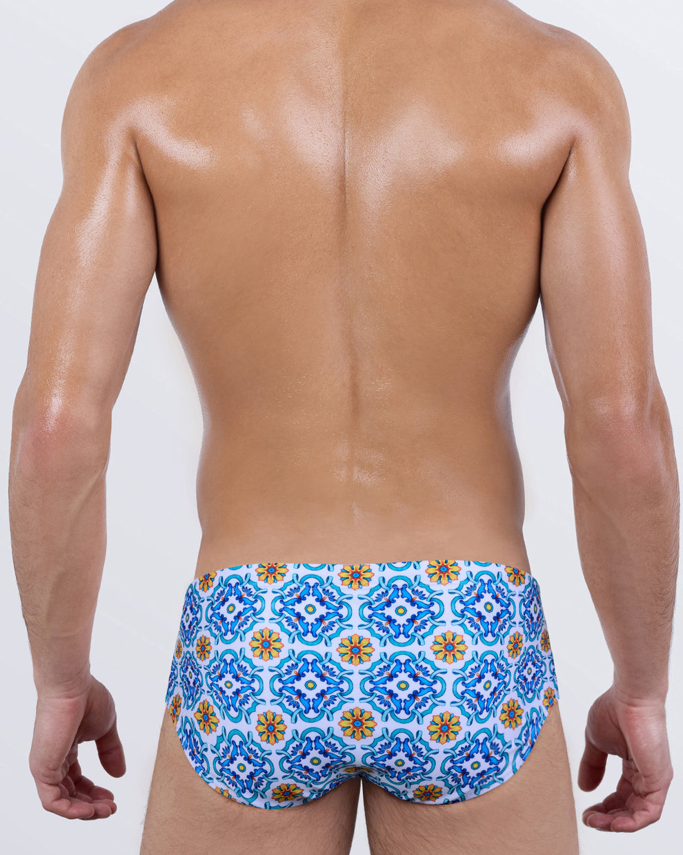 Back of THE TILE IS HIGH men's swim sunga by DC2 Miami – bold luxury swimwear with Mediterranean mosaic pattern, snug athletic fit, and sculpted silhouette.