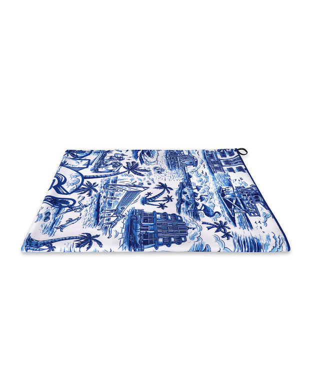 The TOILE DE MIAMI (BLUE) quick-dry microfiber towel featuring a colorful Miami inspired artwork in a bright blue made by the Bang! brand of men&