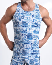 Model wearing the TOILE DE MIAMI (BLUE) matching beach shorts and tank top for a complete look by BANG! Clothes from Miami.