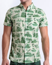 Front view of the TOILE DE MIAMI (GREEN) men’s sleeveless stretch shirt in beige and dark green-colored toile de jouy-inspired print. Designed by BANG! Clothes, a men’s beachwear brand from Miami.