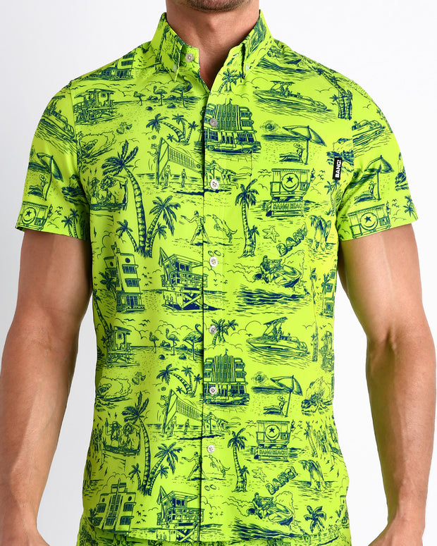  Front view of the TOILE DE MIAMI (NEON GREEN/BLUE) men’s short-sleeve hawaiian stretch shirt in black with white Toile De Jouy art by the Bang! brand of men&
