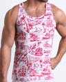 Front view of model wearing the TOILE DE MIAMI (RED) men’s beach ultra-soft cotton tank top in white with red Toile De Jouy art by the Bang! Clothes brand of men's beachwear from Miami.