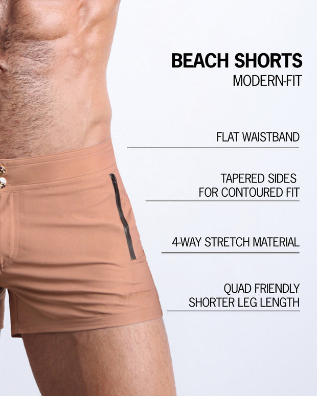 Infographic explaining the many features of these modern fit TOP TAN Beach Shorts by BANG! Clothes. These swimming shorts have a flat waistband, tapered sides for a contoured fit, 4-way stretch material, and quad-friendly leg length. 