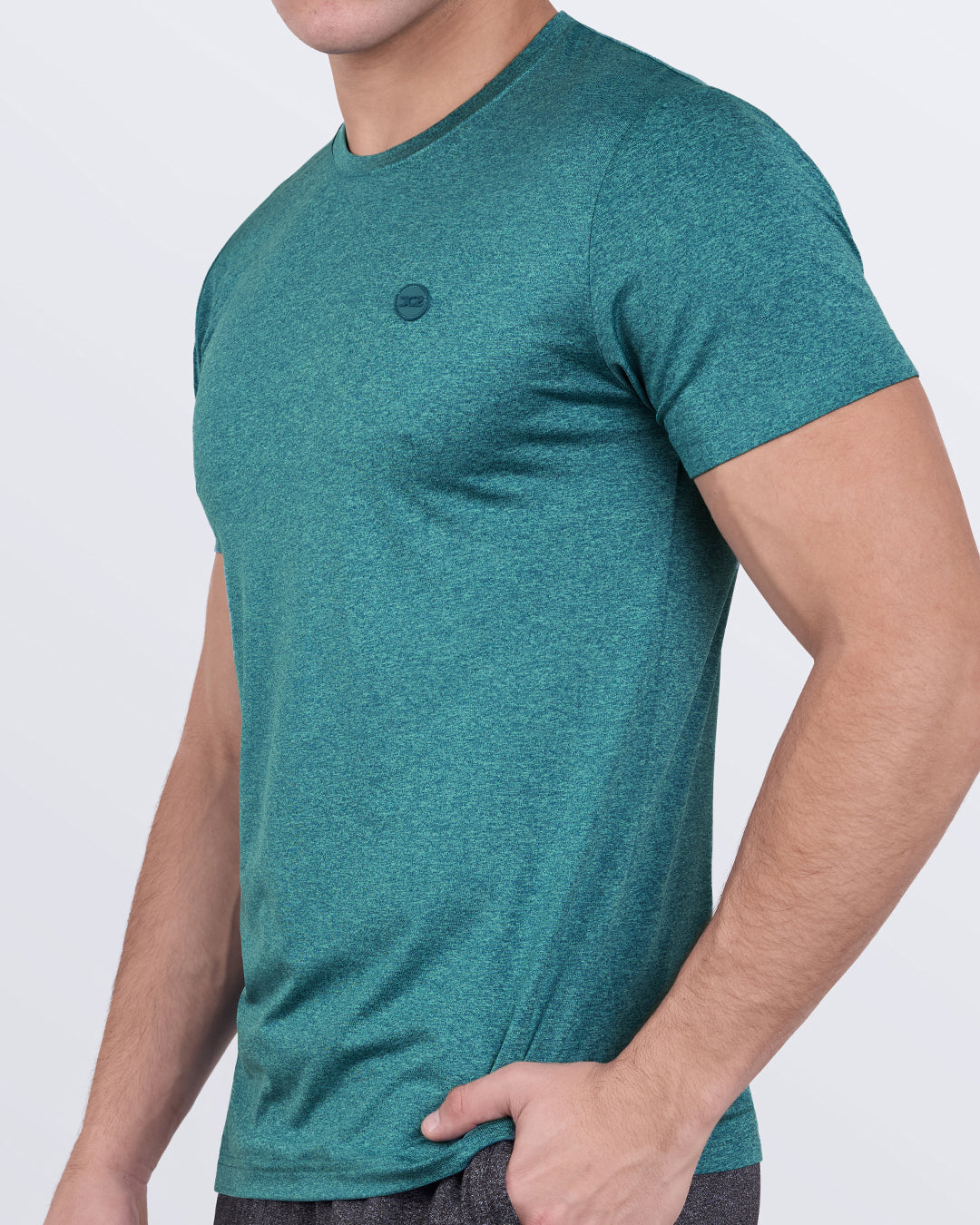 DC2 Trainer Teal Fitness T-Shirt — side view showing tailored sleeves and ergonomic design for flexibility during intense workouts.