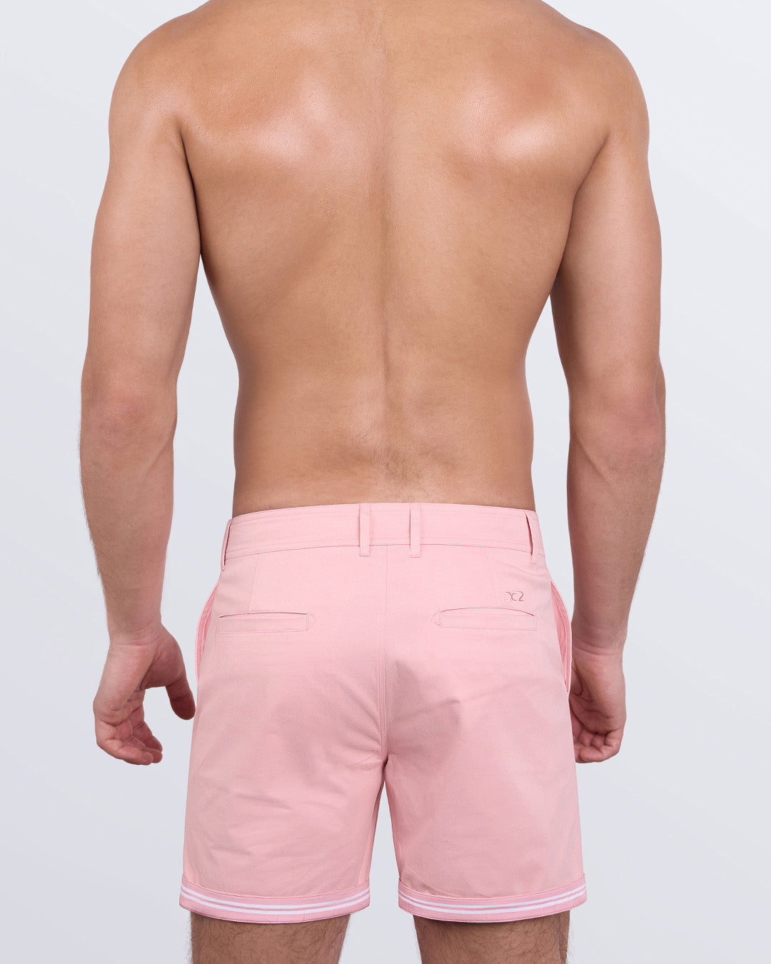 Back view of Ultimate Pink Street Shorts — welt pockets with DC2 logo detail above the right pocket.