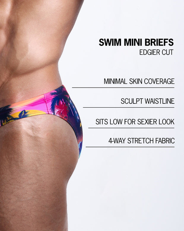 Infographic explaining the features of the UNDER A NEON SKY Swim Mini Brief made by BANG! Clothes. These edgier cut mens swimsuit are minimal skin coverage, sculpts waistline, sits low for sexier look, and 4-way stretch fabric.