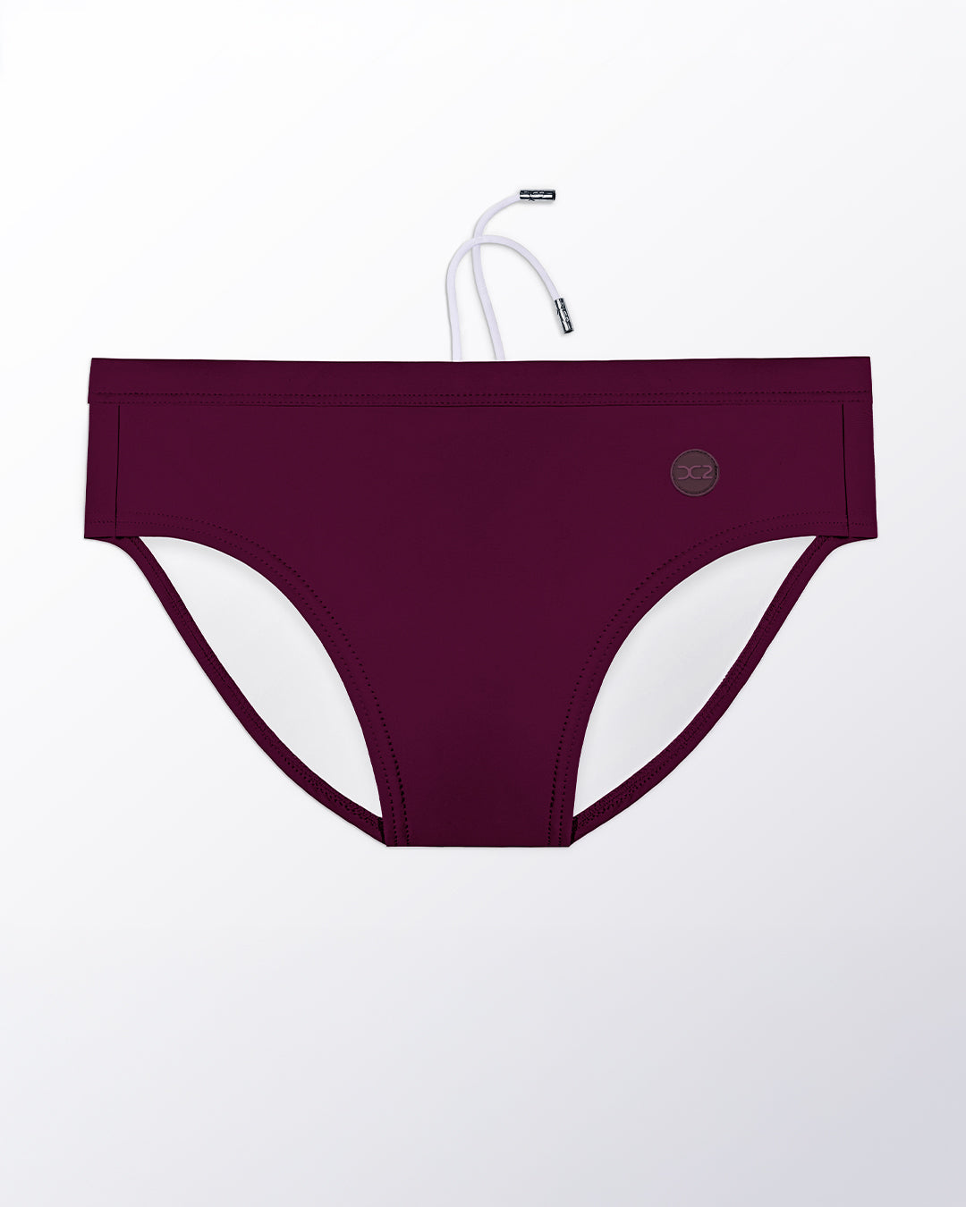 Flat lay of the DC2 Very Berry Swim Brief, featuring a rich berry tone and sleek, sculpted swim brief design.