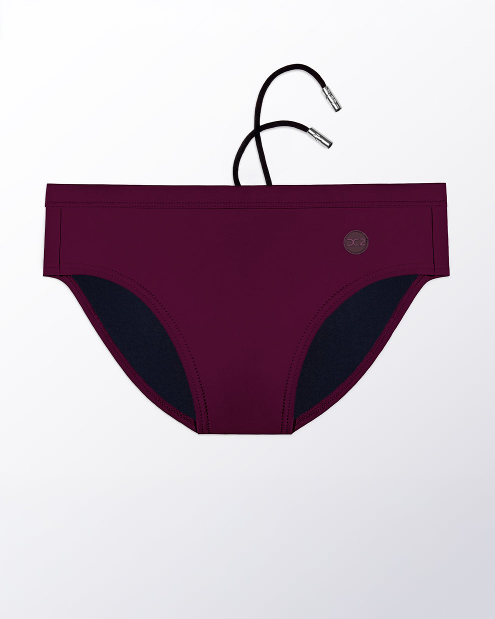 Flat lay of the DC2 Very Berry Swim Brief, featuring a rich berry tone and sleek, sculpted swim brief design.