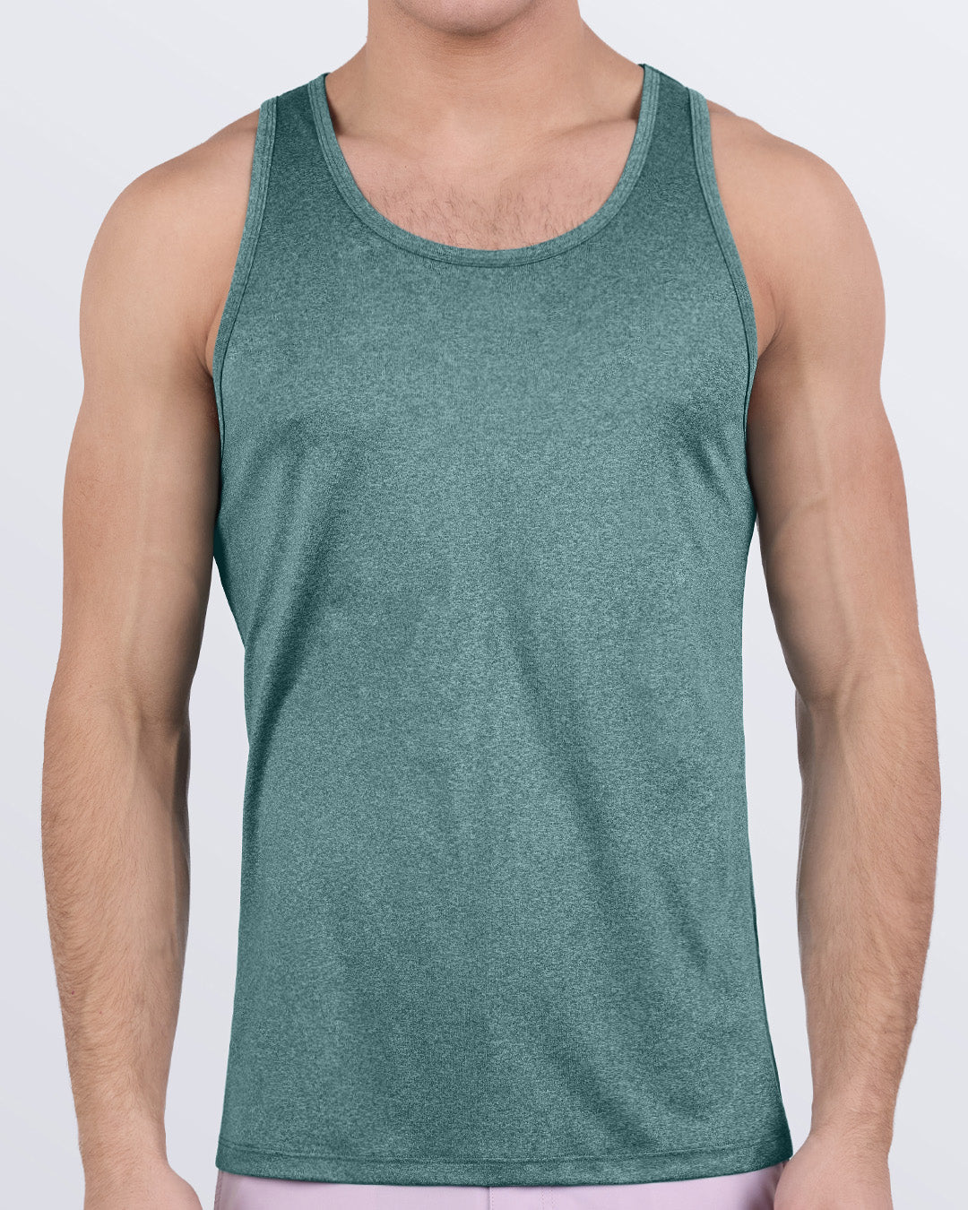 Male model wearing DC2 VIKING GREEN gym tank top for men, made with moisture-wicking performance fabric in a forest green tone, perfect for workout or beachwear.