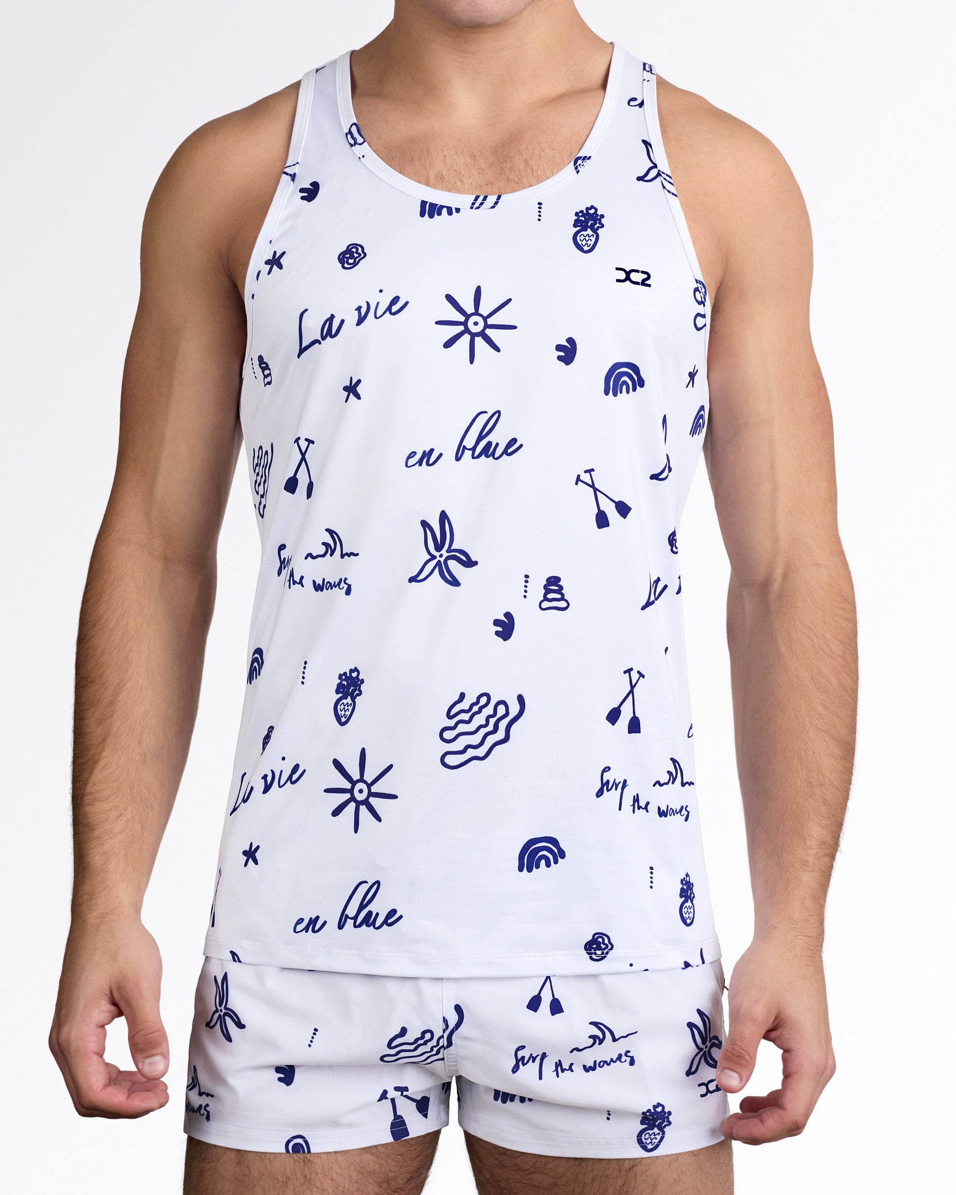 DC2 Viva La Vida (Blue) Tank Top — styled with matching light grey printed shorts, featuring coordinated summer beachwear set design.