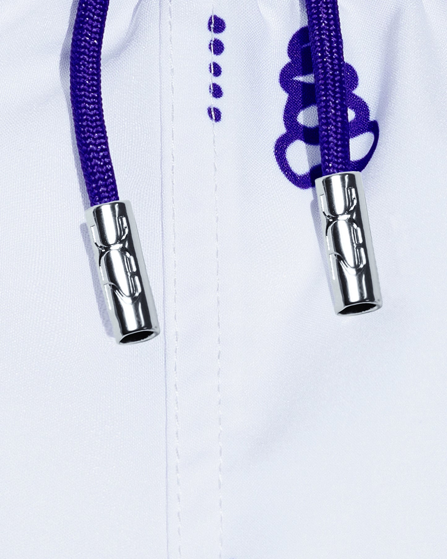 DC2 Viva La Vida (Blue) Poolside Shorts — close-up detail of the side zipper pocket with metallic DC2-branded pull tab and printed fabric.