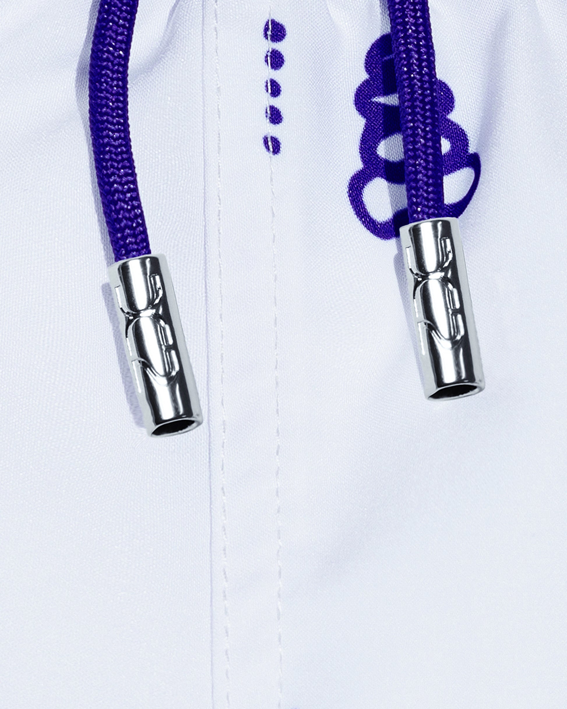 DC2 Viva La Vida (Blue) Poolside Shorts — close-up detail of the side zipper pocket with metallic DC2-branded pull tab and printed fabric.