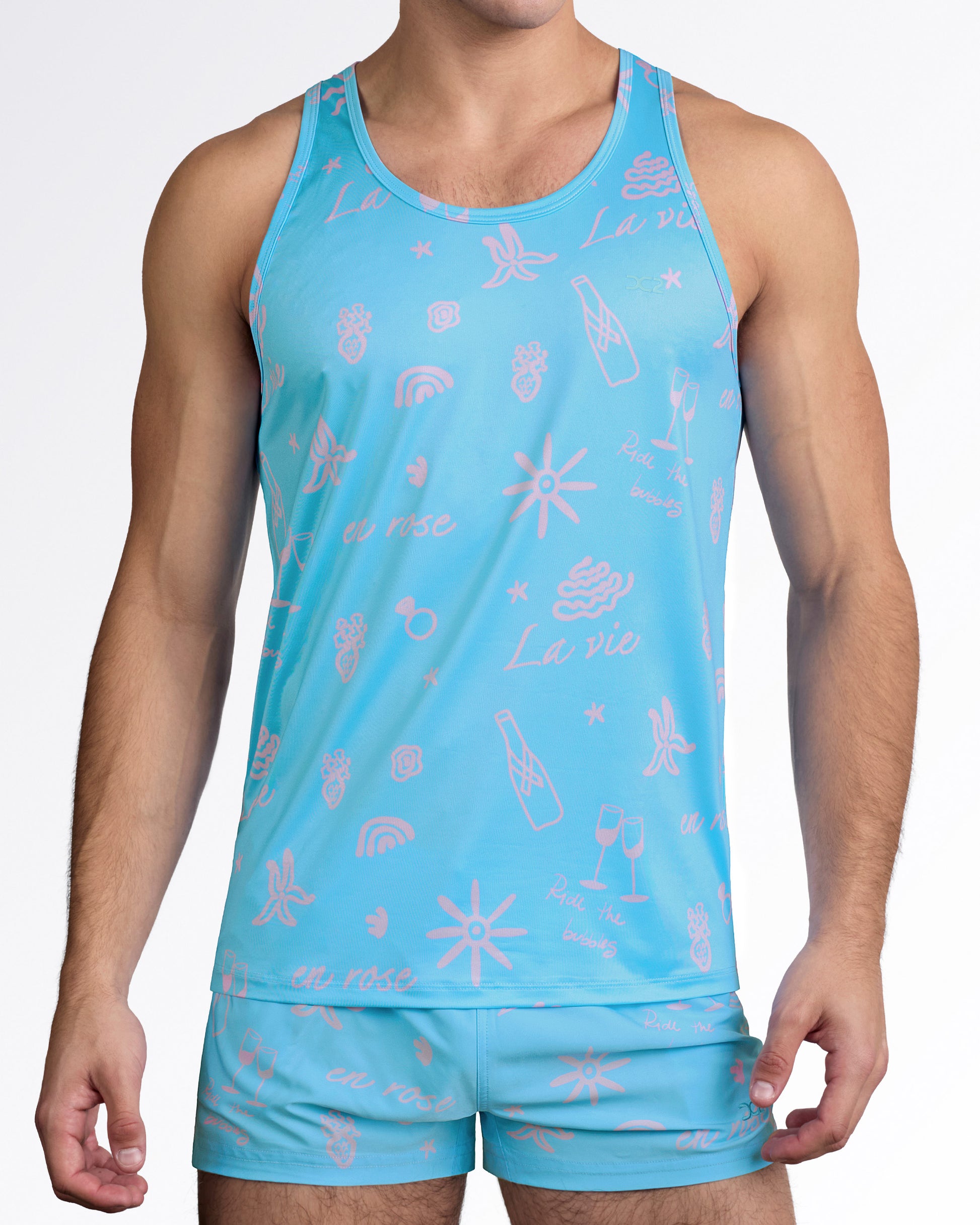 DC2 Viva La Vida (En Rose) Tank Top — styled with matching aqua printed shorts, featuring coordinated summer beachwear set.