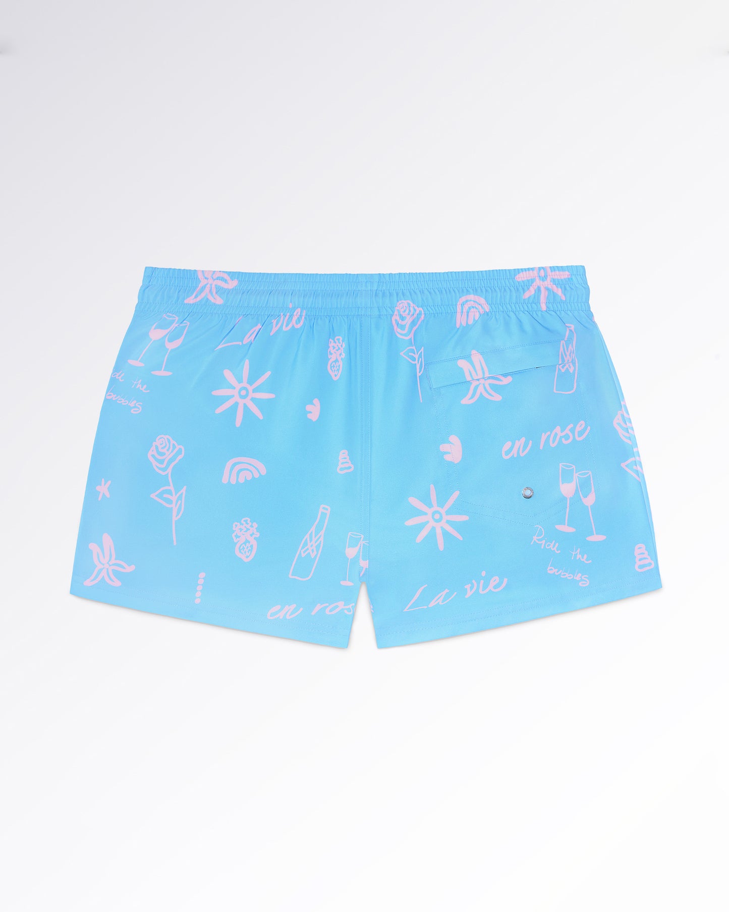 DC2 Viva La Vida (En Rose) Poolside Shorts — flat lay back view displaying the continuous graphic print and back pocket construction.