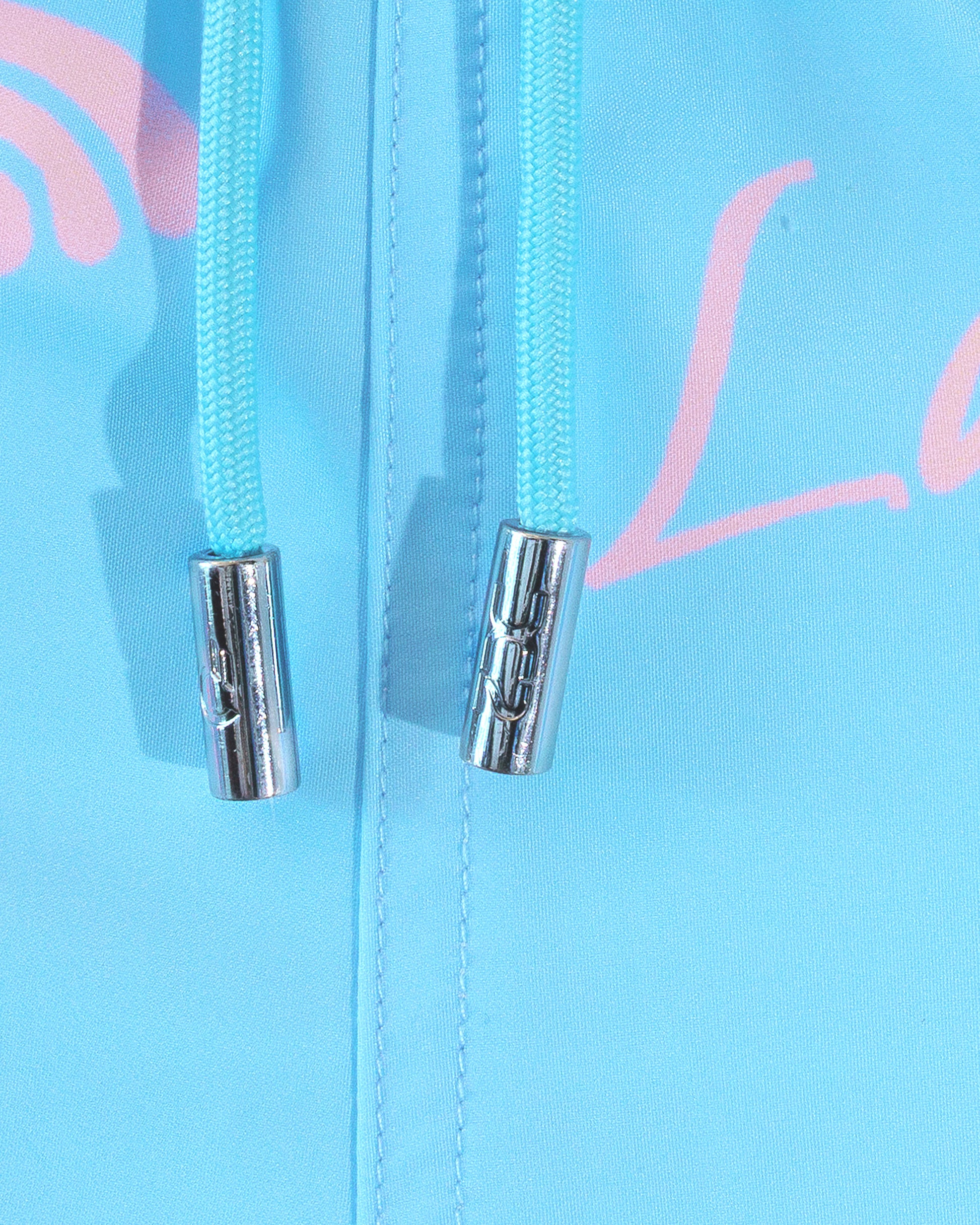 DC2 Viva La Vida (En Rose) Poolside Shorts — close-up detail of the drawstring waist with metal tips and the printed fabric texture.