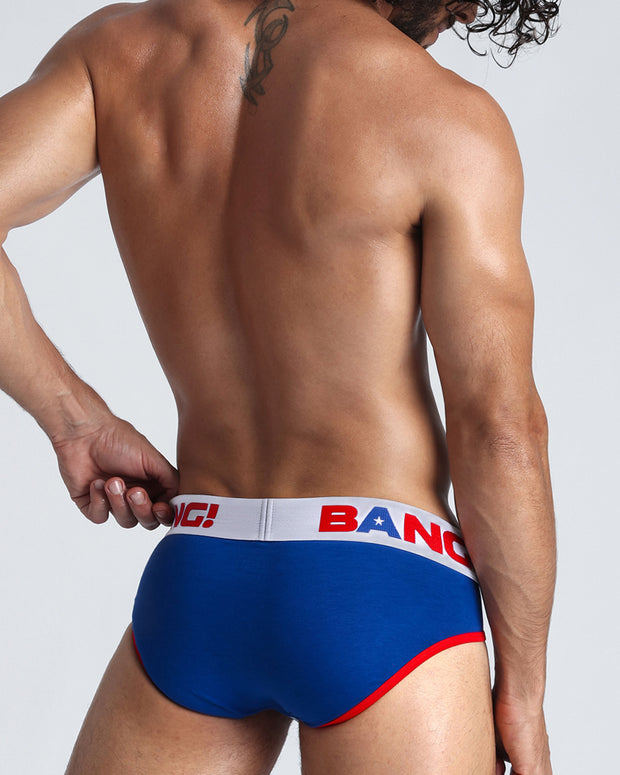 Back view of model wearing the VICTORY from the Sport line Men’s breathable cotton briefs in a royal blue color for men by BANG! Offers light compression for perfect contouring to the body and second-skin fit.