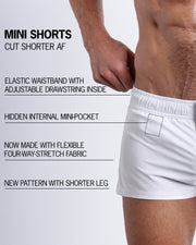 Infographic explaining the WHITE PARTY Mini Shorts features and how they're cut shorter. They have an elastic waistband with an adjustable drawstring inside, they have a hidden internal mini-pocket, now made with flexible four-way stretch fabric and a new pattern with shorter legs.