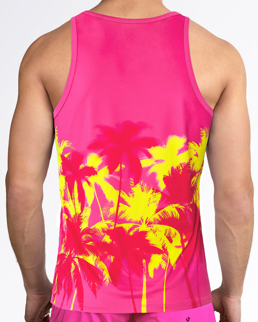 Back view of Wuthering Heights (Fucsia) Tank Top by BANG! — bright pink tank featuring yellow palm tree print with a clean racerback silhouette.