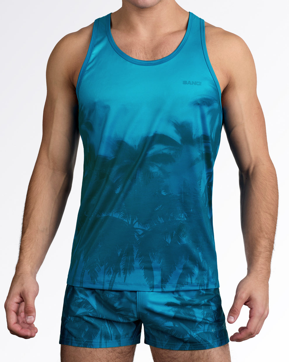 BANG Wuthering Heights (Shades) Gym Tank Top — full body front view styled with matching palm-print shorts for a coordinated beach-to-gym look.