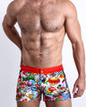 YEAH-YEAH men's beach shorts feature fun and energetic comics-style graphics in bold colors, with a prominent BANG! illustration.
