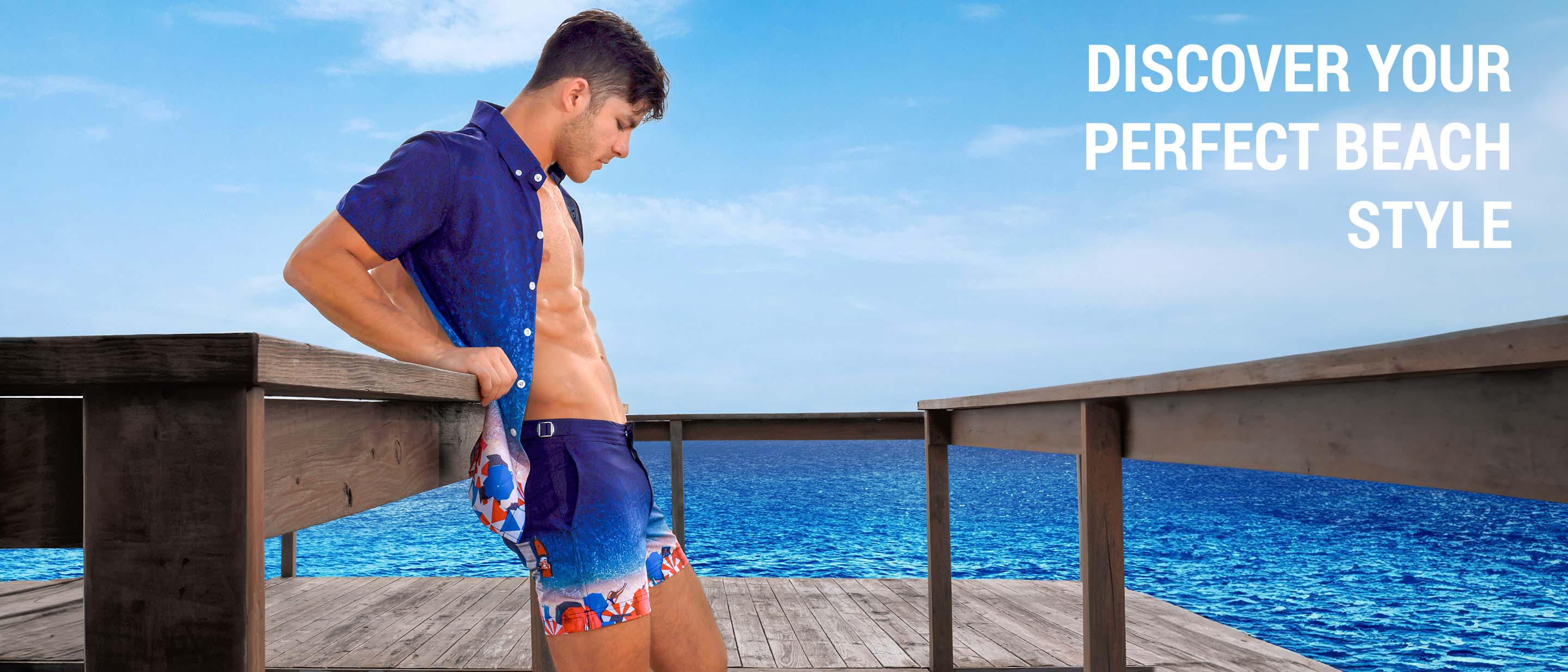 Image of two male models at the beach. The model on the left is wearing the NEO VIOLET Resort Shorts. The model on the right is wearing the NEO VIOLET Swim Brief.