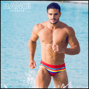 Frontal view of model wearing Stripe'A'Pose ROUX men’s swimwear by the Bang! Clothes brand of men's beachwear from Miami