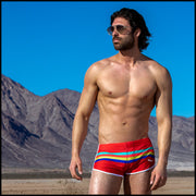 Frontal view of model wearing Stripe'A'Pose ROUX men’s swimwear by the Bang! Clothes brand of men's beachwear from Miami.