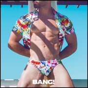 Front view of a sexy male model wearing bang clothes premium swim mini brief yeah yeah print bold colors designer quality fabric