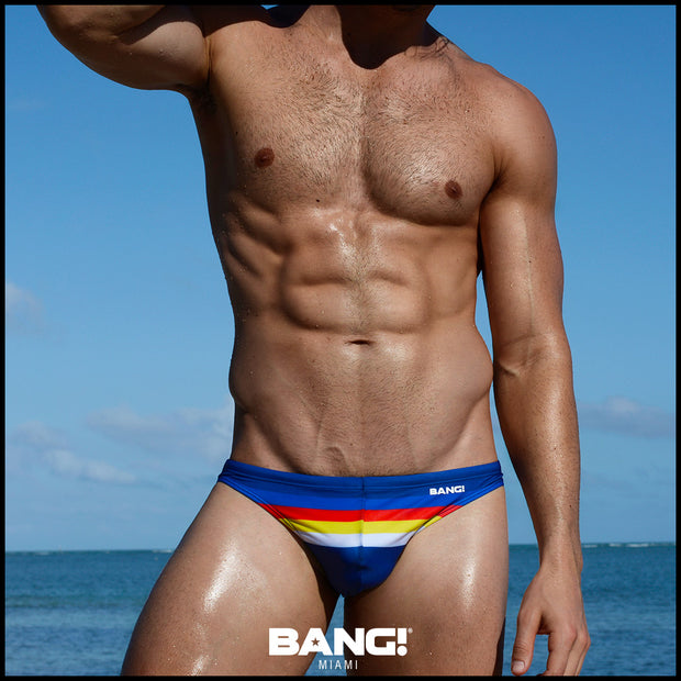 front view of a sexy male model wearing Bang Miami premium designer quality swim mini briefs bold colors swimwear 