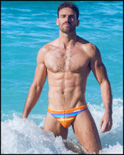 Frontal view of model wearing Stripe A Pose men's swimwear bottom by the Bang! Clothing brand of men's beachwear from Miami.