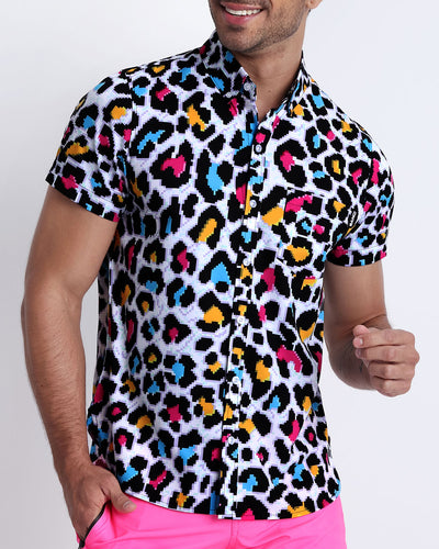 This men's short-sleeve stretch shirt features an 8-bit print of a sexy leopard with bright colors of yellow, hot pink and blue.