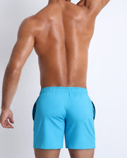Back view of the AERO BLUE men's fitness sweatshorts in a sky blue color by BANG! menswear Miami.
