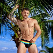Side view of the FOUR EVER STRIPES VOL 1 Summer swimsuit for men in dark black with stripes in red, yellow, blue and green by Bang! Clothing of Miami.
