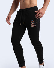 Side view of the BLACK men's sweatpants with zipper pockets by BANG! Clothes based in Miami. This jogger is soft and skin-friendly with two pockets to store small things like phone and keys.