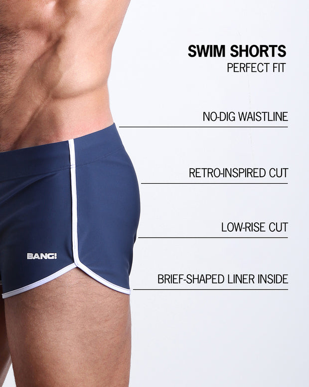 Infographic explaining the features of the BLUE JEAN Swim Shorts made by BANG! Clothes. These perfect fitting mens swim shorts are retro-inspired cut, low-rise cut, brief-shaped liner inside, and have no-dig waistline.