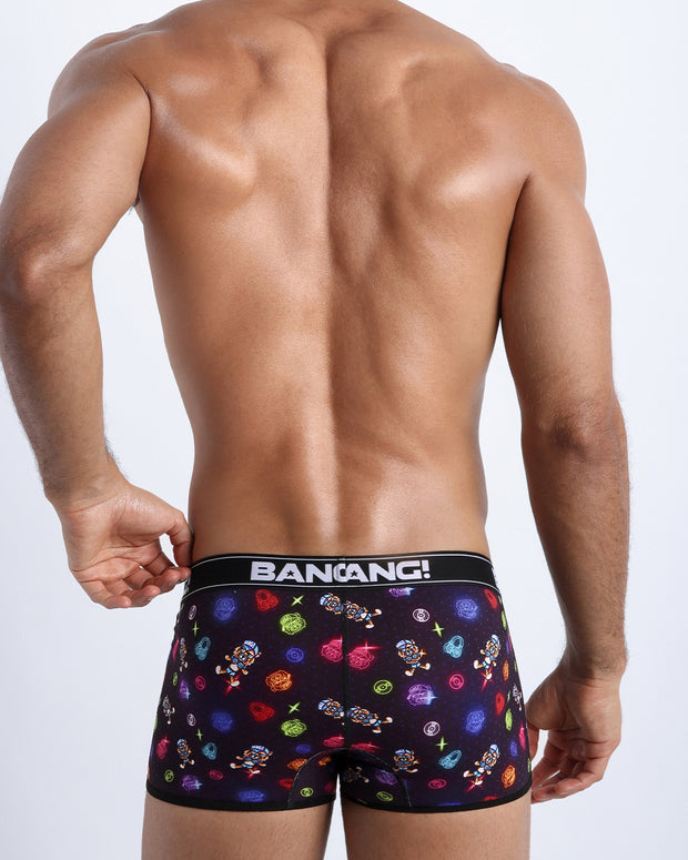 Back view of model wearing the HEY MISTER TJ (CLUB MIX) Men’s beathable cotton boxer briefs for men by BANG! with clubbing and disc-jockey details in dark colors. Underwear trunks provide all-day comfort and secure fit.