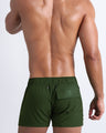 Back view of the ALPHA GREEN beach trunks with for men by BANG! menswear Miami in military army green color.