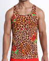 Frontal view of model wearing the CATS N'ROSES men’s beach tank top in cotton with leopard print in brown tones with red roses by the Bang! menswear brand.