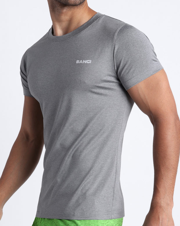 Side view of men’s exercise tee in a dark grey color made by BANG! Clothing the official brand of mens beachwear. 