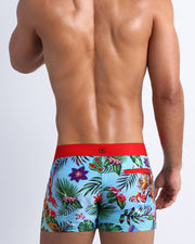 Back view of a sexy male model wearing DISCO JUNGLE  men’s swim bikini made by the Bang! official brand of men's beachwear.