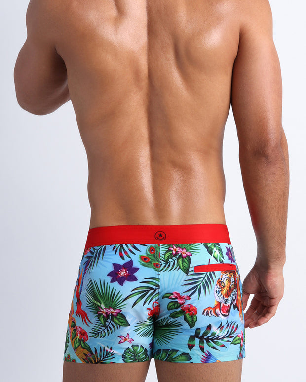 Back view of a sexy male model wearing DISCO JUNGLE  men’s swim bikini made by the Bang! official brand of men&