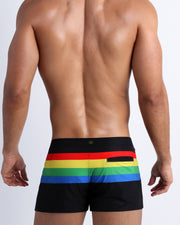 Back side of the FOREVER STRIPES VOL 1 beach swim beach shorts in black with colored bands in green, red, yellow and blue by Bang! Miami.