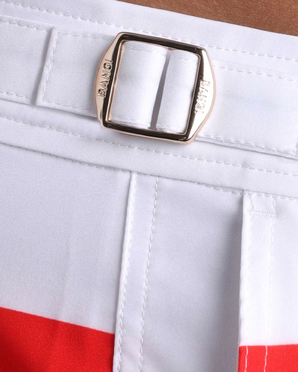 Close-up view of the FOUREVER STRIPES VOL 2 men’s swimwear, showing custom branded golden adjustable side buckles.