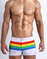 Male model wearing the FOUREVER STRIPES VOL 2 men's swim bottoms by the Bang! Clothes brand of men's swimwear from Miami.