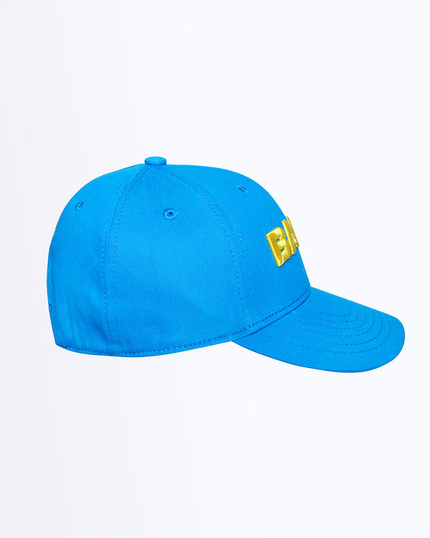 Side View Bang! Clothing HIGH BLUE streetwear fitted hat in a bright blue color is structured to battle the heat with ventilation eyelets for extra breathability designed by Bang! The official brand of menswear.