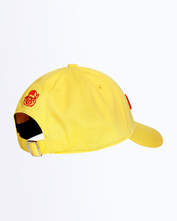 Side view of Bang! Clothing’s HIGH YELLOW iconic dad hat with a cool tiger head embroidered in a red color. Features a one size fits all with a silver adjustable back strap.