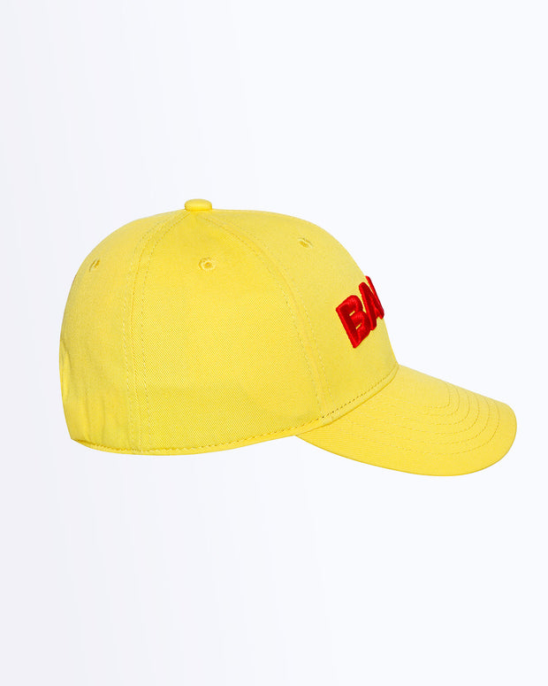 Side View Bang! Clothing HIGH YELLOW streetwear fitted hat in a yellow color is structured to battle the heat with ventilation eyelets for extra breathability designed by Bang! The official brand of menswear.